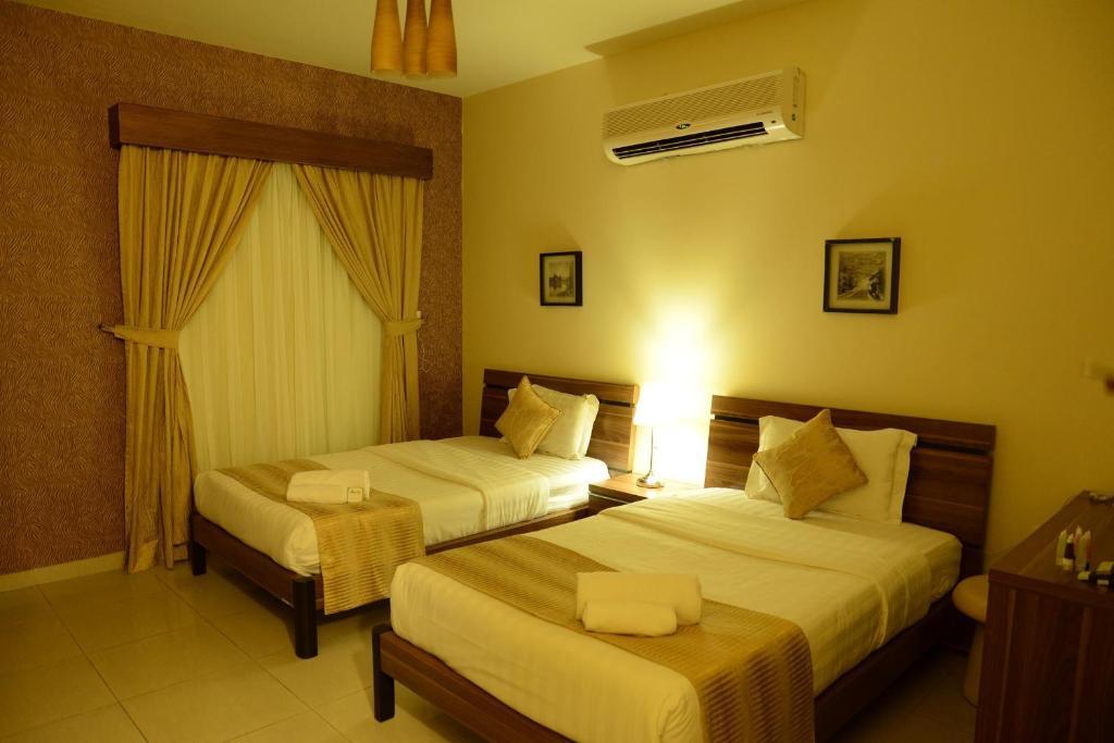 Silver City Hotel Apartments Jeddah Room photo